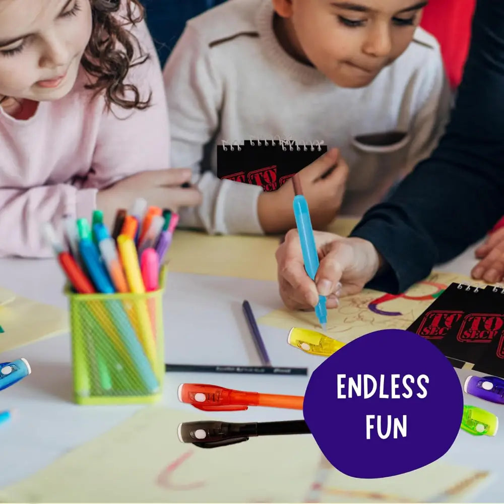 4E’s Novelty Fun Pens for Kids – 12 Magic UV Light Pens Notebooks & Goodie Bags for Spy Adventures - Party Favors
