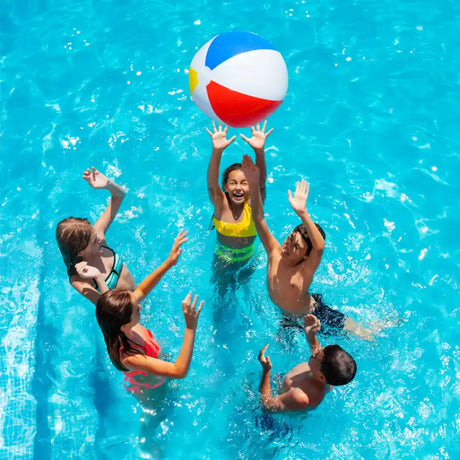 Children playing with a beach ball.