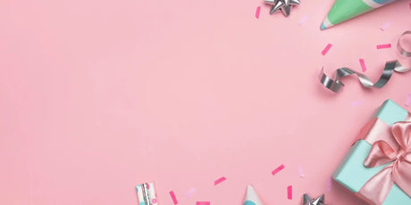 Pastel gift box with pink ribbon.