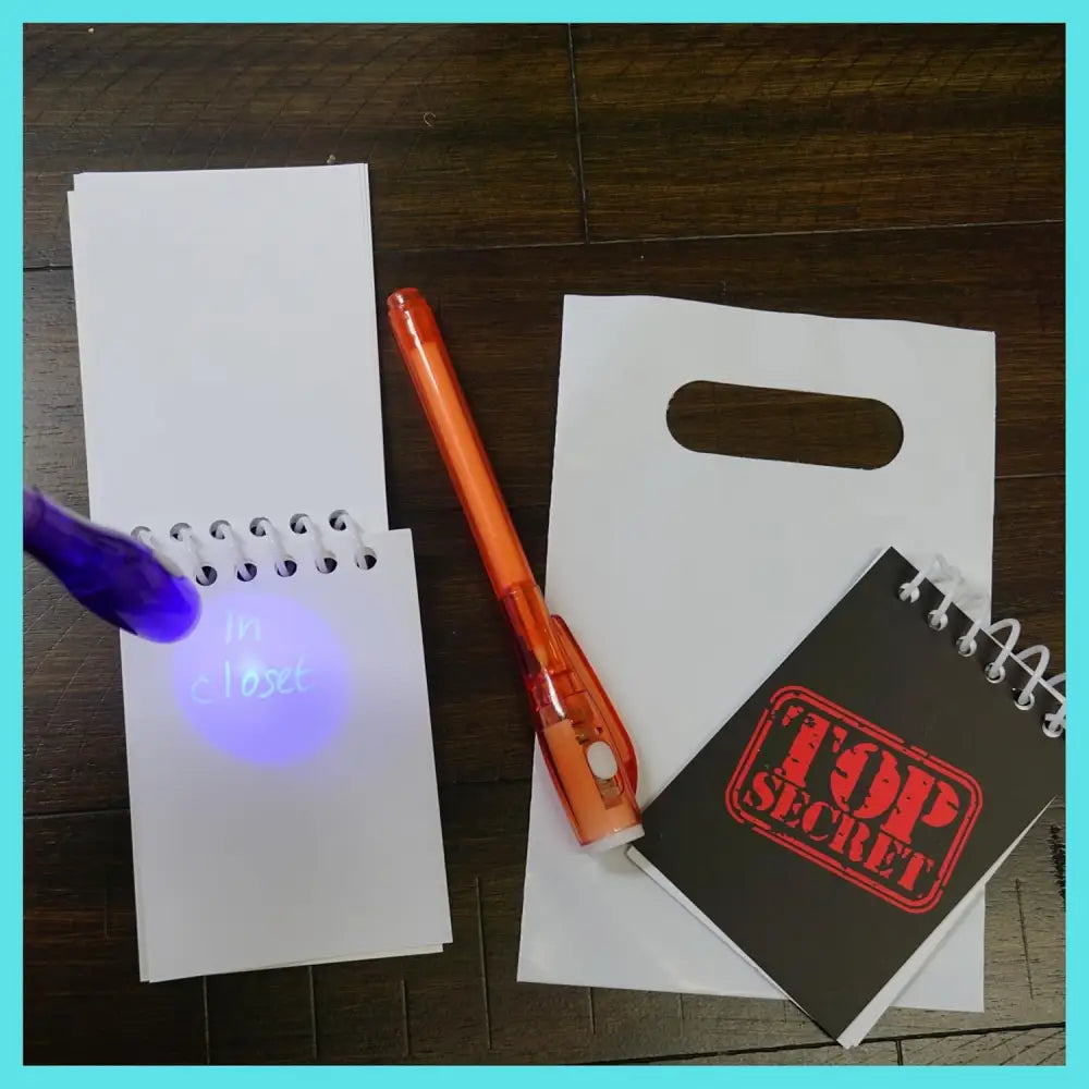 4E’s Novelty Fun Pens for Kids – 12 Magic UV Light Pens Notebooks & Goodie Bags for Spy Adventures - Party Favors